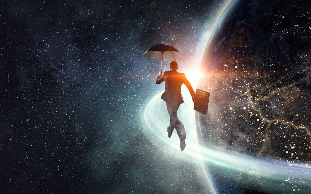 Expert Marketing Services An expert marketing professional with an umbrella hopping along an orbit of earth.