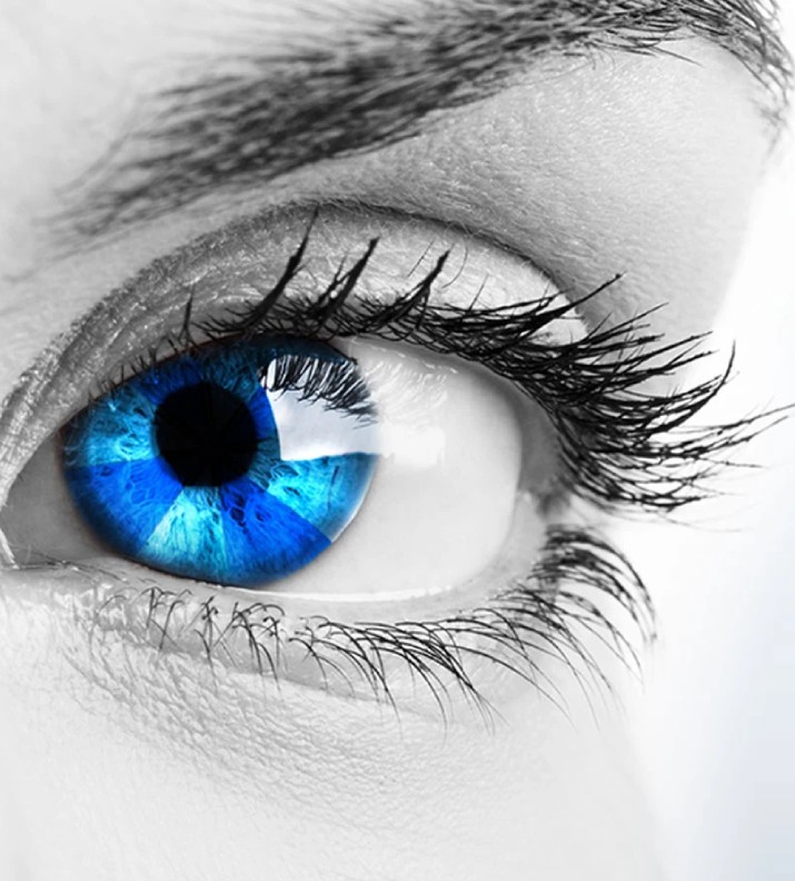 An eye with a white and blue umbrella faded into the pupil.